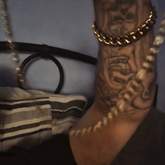 gold looking chain Other - A gold plated/colored chain.